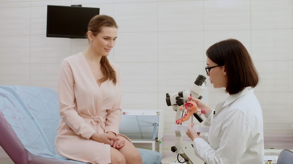 woman speaking with doctor about gynecologic health